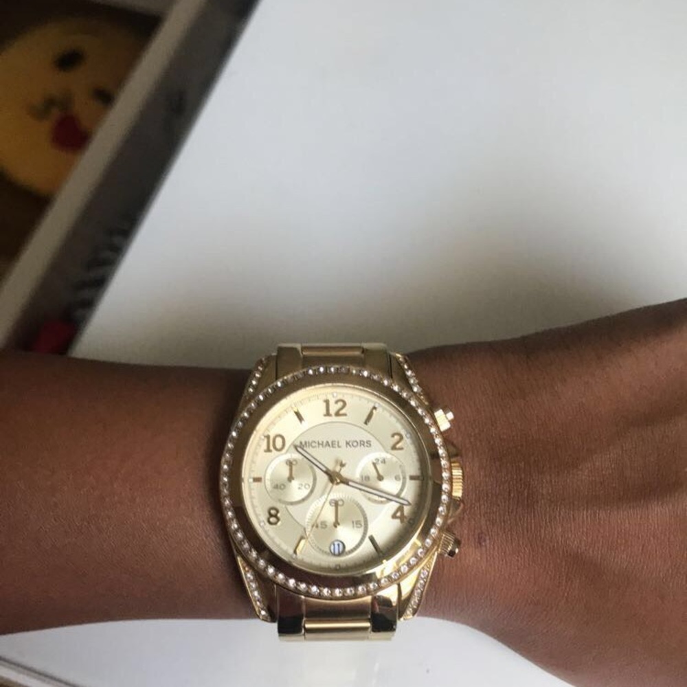 MK gold watch